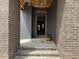 The front entrance is brick with a covered porch at 269 Deer Tail Ln # 44, Fuquay Varina, NC 27526