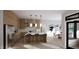 Modern kitchen with stainless steel appliances, island seating, and custom cabinets at 269 Deer Tail Ln # 44, Fuquay Varina, NC 27526