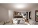 Open-concept living area with sofas that connects to kitchen with an island at 269 Deer Tail Ln # 44, Fuquay Varina, NC 27526