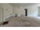 Large living room with exposed wiring and pipes awaiting finishes at 269 Deer Tail Ln # 44, Fuquay Varina, NC 27526