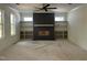 Bright living room with a fireplace and built-in shelves, creating a cozy atmosphere at 269 Deer Tail Ln # 44, Fuquay Varina, NC 27526