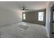 Main bedroom featuring natural light, wainscotting and neutral color palette at 269 Deer Tail Ln # 44, Fuquay Varina, NC 27526
