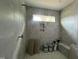 Custom tiled shower showcasing a built-in niche, bench, and decorative floor at 269 Deer Tail Ln # 44, Fuquay Varina, NC 27526