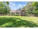 Charming two-story home with a well-maintained lawn and complemented by mature trees at 2833 Praire View Pt, Wendell, NC 27591