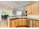 Open kitchen featuring stainless steel appliances, corner sink and breakfast area at 2833 Praire View Pt, Wendell, NC 27591
