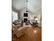 Cozy living room with a fireplace, vaulted ceiling and ample seating at 2833 Praire View Pt, Wendell, NC 27591