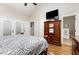 Spacious main bedroom features wood floors, ceiling fan and closet space at 2833 Praire View Pt, Wendell, NC 27591
