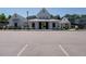 Attractive community building with parking and covered entrance at 2909 Thurman Dairy Loop, Wake Forest, NC 27587