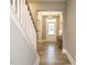 Inviting foyer with hardwood floors and a view of the staircase at 2909 Thurman Dairy Loop, Wake Forest, NC 27587