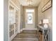 Elegant foyer with hardwood floors and stylish decor, creating a welcoming entrance at 2909 Thurman Dairy Loop, Wake Forest, NC 27587