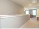 Hallway showcasing neutral walls, access to play area and recessed lighting at 2909 Thurman Dairy Loop, Wake Forest, NC 27587