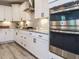 Gourmet kitchen featuring stainless steel appliances and sleek design elements at 2909 Thurman Dairy Loop, Wake Forest, NC 27587