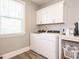 Convenient laundry room with modern washer and dryer, natural light, and ample storage at 2909 Thurman Dairy Loop, Wake Forest, NC 27587