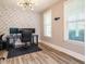 Modern office space with unique wallpaper, hardwood floors, and natural light at 2909 Thurman Dairy Loop, Wake Forest, NC 27587