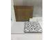 Design materials featuring brown cabinet door with floor and wall tiles at 332 White Oak Garden Way # 221, Garner, NC 27529