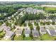 An aerial view showcasing a neighborhood with tree-lined streets and well-maintained homes at 333 Trout Valley Rd, Wake Forest, NC 27587