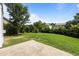 Expansive backyard featuring lush green grass and privacy landscaping perfect for outdoor enjoyment at 333 Trout Valley Rd, Wake Forest, NC 27587