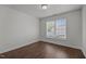 Bedroom featuring a window providing plenty of natural light and hardwood floors at 333 Trout Valley Rd, Wake Forest, NC 27587