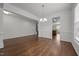 Bright dining area featuring hardwood floors and modern chandelier lighting at 333 Trout Valley Rd, Wake Forest, NC 27587