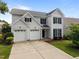 Charming two-story home with a two-car garage, complemented by a well-manicured lawn and tidy landscaping at 333 Trout Valley Rd, Wake Forest, NC 27587