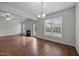 Bright living space featuring hardwood floors, natural light, and a cozy fireplace at 333 Trout Valley Rd, Wake Forest, NC 27587