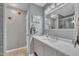 Updated bathroom with gray walls, decorative stars and a large vanity at 345 Kinsman Ct, Fuquay Varina, NC 27526