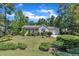 Well-maintained single-story home with mature trees and beautiful landscaping for added curb appeal at 345 Kinsman Ct, Fuquay Varina, NC 27526