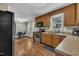 Charming kitchen equipped with stainless steel appliances and an eat-in dining area at 345 Kinsman Ct, Fuquay Varina, NC 27526