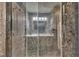 Updated shower with mosaic tile and dual shower heads at 345 Kinsman Ct, Fuquay Varina, NC 27526