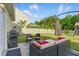 Enjoy the outdoors on this patio with comfortable seating, a grill, and a play set in the backyard at 4108 Lady Slipper Ln, Durham, NC 27704