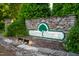 Stone entrance sign for Glenn Stone community set amongst professionally maintained landscaping at 4108 Lady Slipper Ln, Durham, NC 27704