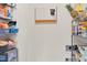 Walk-in pantry features wire shelves and storage with tile floors at 4108 Lady Slipper Ln, Durham, NC 27704
