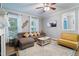 Bright living room showcasing the furniture, rug, and neutral walls, offering a welcoming space at 429 Marsh Landing Dr, Holly Springs, NC 27540