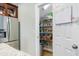 Organized pantry with shelving for food storage, providing practical kitchen solutions at 429 Marsh Landing Dr, Holly Springs, NC 27540
