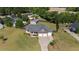 Spacious home with a three-car garage, well-maintained lawn, and a large, fenced backyard, perfect for outdoor activities at 45 Hawley Ridge Dr, Dunn, NC 28334