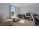 Cozy bedroom with a neutral color palette and a window providing natural light at 45 Hawley Ridge Dr, Dunn, NC 28334