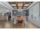 Inviting dining room with coffered ceiling, wood floors, and ample natural light, perfect for entertaining at 45 Hawley Ridge Dr, Dunn, NC 28334