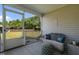 Screened porch with furniture and view of the backyard at 45 Hawley Ridge Dr, Dunn, NC 28334