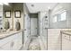 Bathroom featuring double vanity with granite countertops and a walk-in shower at 4504 Beckel Rd, Willow Springs, NC 27592