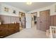 Bedroom showing a dresser and views through open doorways; complemented by neutral colors and modern decor at 4504 Beckel Rd, Willow Springs, NC 27592