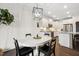 Bright dining room with stainless appliances view, ideal for Gathering meals at 4504 Beckel Rd, Willow Springs, NC 27592