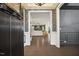 Elegant foyer with hardwood floors, wainscoting and views into the main living area at 4504 Beckel Rd, Willow Springs, NC 27592