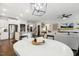 Open-concept living area seamlessly connecting the kitchen, dining, and living spaces at 4504 Beckel Rd, Willow Springs, NC 27592