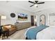 Spacious main bedroom with adjacent seating area and a glimpse into the walk-in closet at 4504 Beckel Rd, Willow Springs, NC 27592