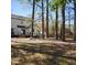 Spacious backyard featuring a wooden deck, offering an ideal space for outdoor activities and relaxation at 5013 Brassfield Dr, Rocky Mount, NC 27803
