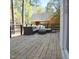 Outdoor living space featuring a comfortable seating area and a view of the surrounding trees at 5013 Brassfield Dr, Rocky Mount, NC 27803