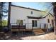 Rear exterior showcasing a wooden deck, providing a comfortable outdoor living space with sliding glass doors at 5013 Brassfield Dr, Rocky Mount, NC 27803