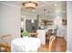 Modern kitchen featuring stainless steel appliances, white cabinetry, and an open layout perfect for cooking and dining at 5013 Brassfield Dr, Rocky Mount, NC 27803