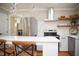 Bright kitchen featuring white countertops, stainless steel appliances, and stylish fixtures, perfect for cooking at 5013 Brassfield Dr, Rocky Mount, NC 27803