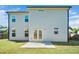 Backyard exterior features a concrete patio and a lawn at 51 Duchess Ave, Franklinton, NC 27525